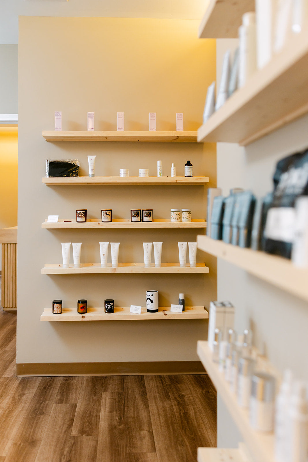 Retail shelves of professional skincare in the Esthetics With Me spa in McHenry, Illinois
